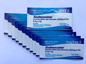a stack of single-dose suboxone tablets